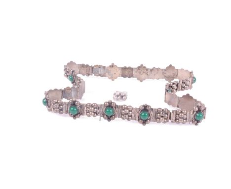 A vintage sterling and green paste cabochon panel belt adapted from three bracelets, the panels decorated with bold beaded cl
