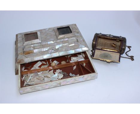 A portable leather barrel shaped sewing box with fitted interior and tools and mother of pearl decoration together with a lar