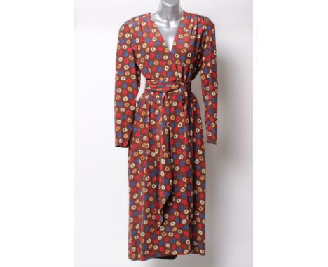 A 1980s brown patterned silk wraparound dress, with a Christian Dior Boutique label,  zip cuffs and a separate sash. UK size 