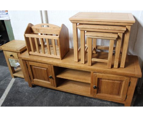 A group of light oak furniture, to include a TV/entertainment unit (h: 56cm  w: 151cm  d: 40cm), side table (h: 61cm  w: 42cm