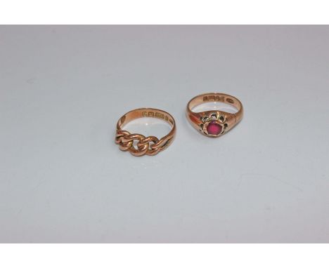 Two 9ct gold rings, the first with bezel set red paste stone with pierced surround together with a rose gold knot ring. 6.1g 