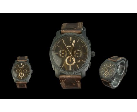 Fossil Gentleman's Wristwatch, brown and black leather strap black face, with gold baton numerals and subsidiary dials.
