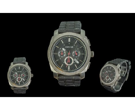 Fossil Gentleman's Wristwatch, black strap and black face, with silver baton numerals and subsidiary dials.

