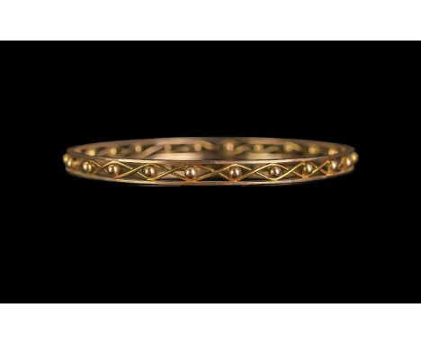 Edwardian Period 1902-1910 Pleasing 9ct Gold Openworked Bangle, marked 9ct.  Criss/cross bauble design.  Weight 11.4 grams.  