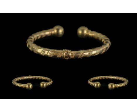 Ladies Attractive 9ct Gold Good Quality Hinged Cuff Bangle with excellent design opens and closes on a spring full hallmark f