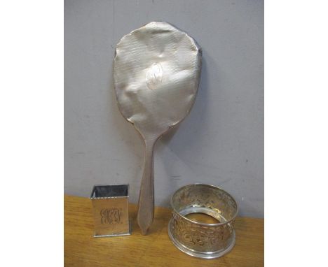 Mixed silver to include a dressing table mirror, match box cover and a coasterLocation: 