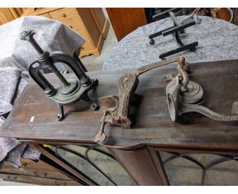 A collectable Original Safety table mounted corkscrew, a press and a slicerLocation: G 