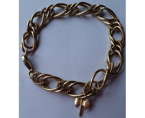 A 9ct gold open link bracelet stamped 375 having a double axe charm, indistinctly stamped, total weight g 