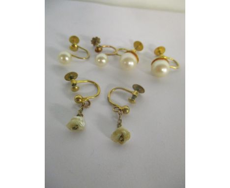 9ct gold and yellow metal earrings to include two pairs of cultured pearl earrings and one pair of ricicle pearl drop earring