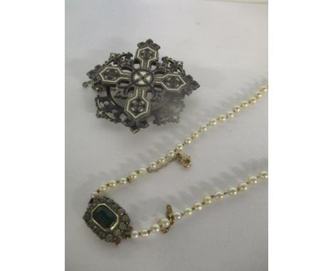 A single row graduated 97 cultured pearl knotted necklace, stamped silver set with green white paste, total weight 16.6g, tog