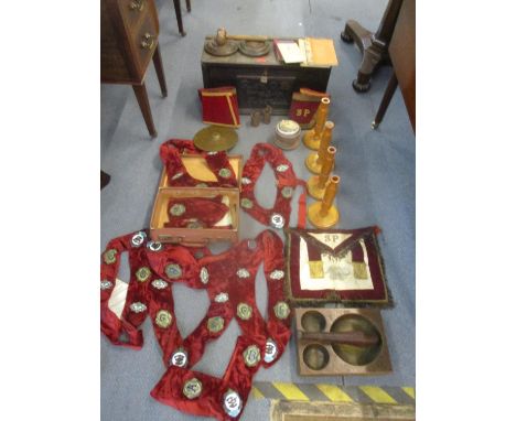 A carved oak chest for the Royal Order of Buffaloes Regalia, dated 1931 containing various items including a wooden pestle an