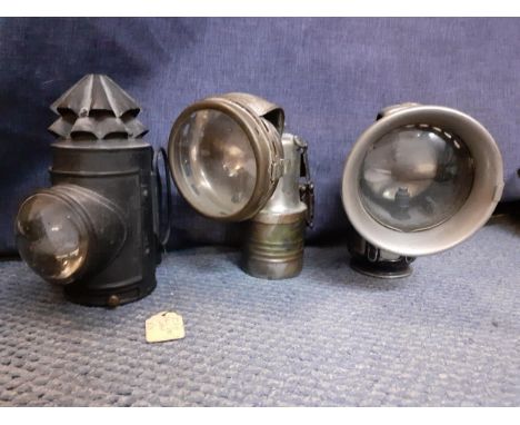 Two vintage bicycles lamps and a vintage Bull's Eye police lampLocation: RWM 