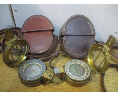 Two leather cased compasses to include a military issue Barker &amp; Son Mk III and a Lawes Robjohns compass 