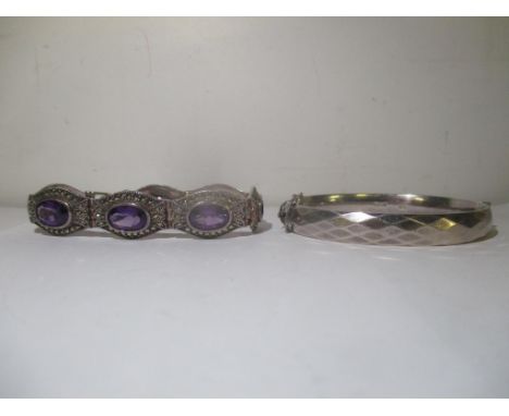 An amethyst and marcasite silver bracelet together with a silver bangle, 70.1gLocation: 