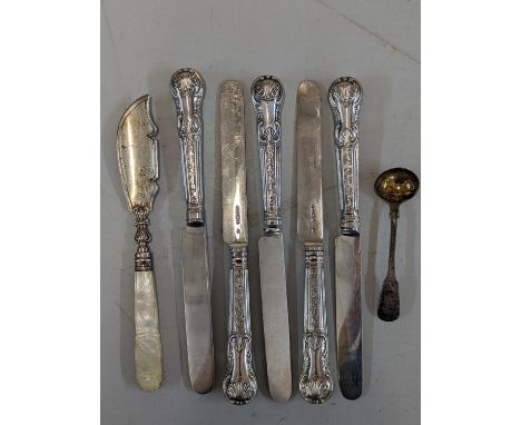 A group of five silver blade knives with filled handles, together with mother of pearl and silver fish knives and a silver sp