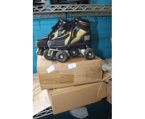 Two pairs of new roller skates &amp; one other 