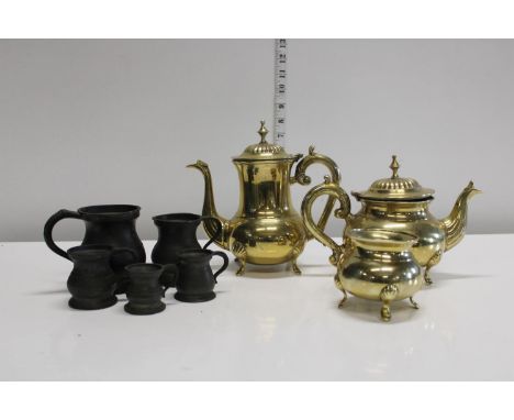 A set of pewter measuring mugs &amp; plated tea set 