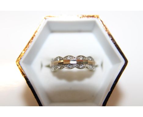A white &amp; yellow 9ct gold ring 