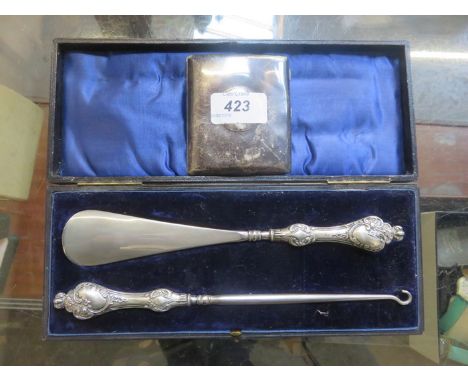 SILVER CIGARETTE CASE AND CASED SILVER HANDLED BUTTON HOOK PLUS SHOE HORN 