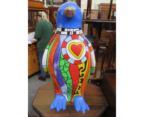 HANDPAINTED FIBRE GLASS MODEL PENGUIN, SIGNED AND DATED 2009