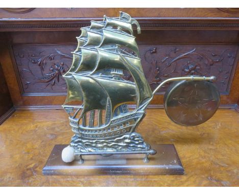 BRASS VINTAGE GALLEON FORM GONG WITH STRIKER ON WOODEN STAND 