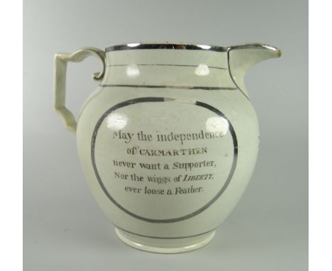 A SWANSEA POTTERY SILVER-LUSTRE DECORATED JUG FOR CARMARTHEN POLITICIAN JOHN JONES (1777-1842) OF YSTRAD with titled portrait