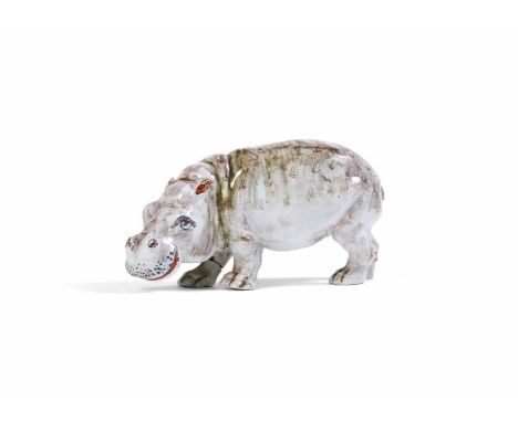 A DUTCH DELFT MODEL OF A HIPPOPOTAMUS LATE 19TH CENTURY With  iron-red pseudo De Grieksche A Factory mark for Adrianus Kocx, 
