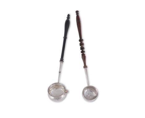 A GEORGE II SILVER PUNCH LADLE  SIMON PANTIN II, LONDON CIRCA 1730  With a turned wooden handle and engraved with a crest  38