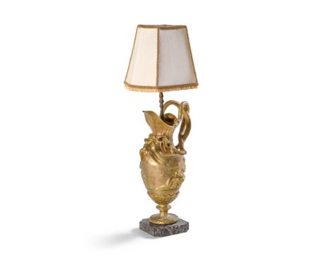 A FRENCH GILT METAL AND SERPENTINE MARBLE TABLE LAMP  CIRCA 1900  The ewer of classical form after a design by Sigisbert Fran