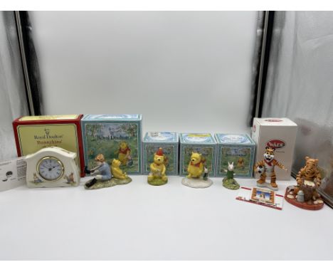 Four Boxed Royal Doulton Winnie The Pooh Figurines along with Royal Doulton Bunnykins Clock and Wade Tony The Tiger and one a