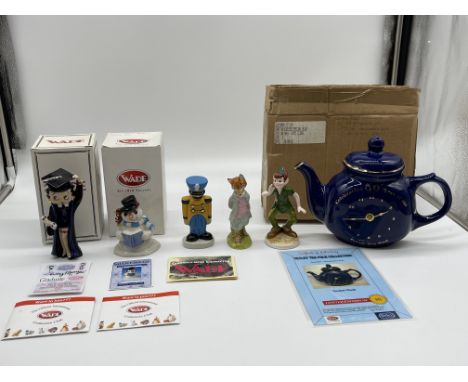 Assorted Lot to include Wade, Beswick, Disney and Tetley Tea Fold Collection Teapot Clock. 
Good condition, no damage.