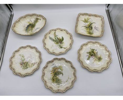 Four Antique Royal Doulton Burslem Plates along with Two Antique Four Legged Royal Doulton Burslem Dishes. 
Good condition, n