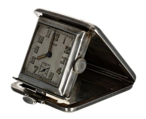 Eros square silver travel purse watch, import hallmarks London 1935, the folding engine turned and engraved cushion case reve