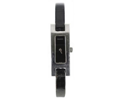 Gucci stainless steel lady's wristwatch, reference no. 3900L, serial no. 030xxxx, rectangular black dial, modern black leathe