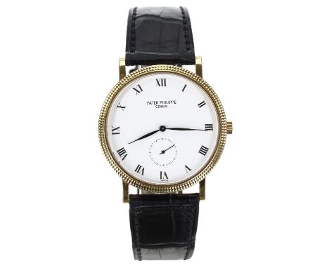Patek Philippe Calatrava 18ct gentleman's wristwatch, reference no. 3919, hobnail bezel, white dial with Roman numerals and a