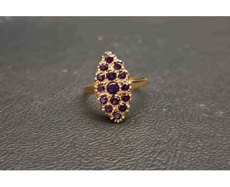 ATTRACTIVE AMETHYST CLUSTER RING the multi amethysts set in marquise shaped setting, in all approximately 0.68cts, on a nine 
