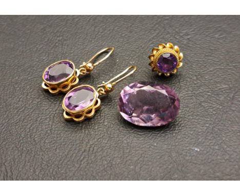 PAIR OF AMETHYST DROP EARRINGSeach with oval cut amethyst drops in nine carat gold, the amethysts totalling approximately 3ct