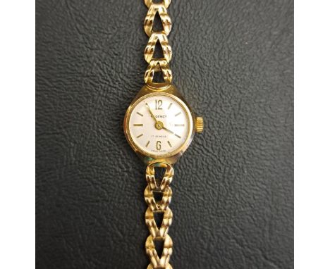 LADIES REGENCY NINE CARAT GOLD CASE WRISTWATCHthe dial with Arabic 6 and 12 and further five minute baton markers, the sevent