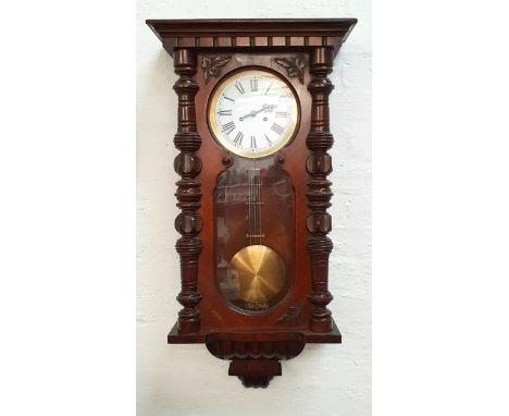 MAHOGANY CASED VIENNA WALL CLOCKthe circular white enamel dial with Roman numerals, with pendulum, 91cm high