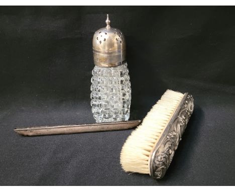 SMALL SELECTION OF SILVER AND SILVER MOUNTED ITEMScomprising a silver topped sugar sifter, Birmingham 1933; a silver backed b