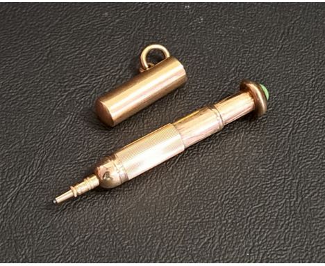 NINE CARAT GOLD SAMPSON MORDAN & CO. TELESCOPIC PROPELLING PENCILwith green stone finial and outer cover, 5.7cm long (fully e