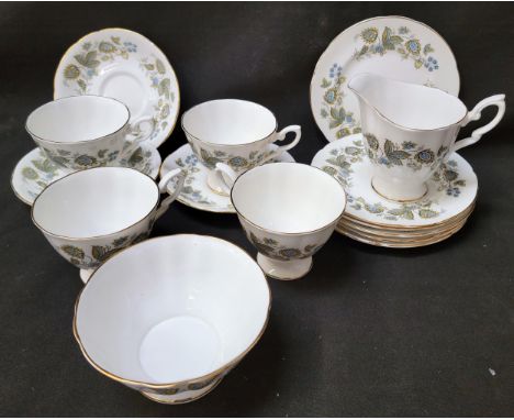 ROYAL STAFFORD TEA SETthe foliate decoration on a white ground, comprising six cups, saucers and side plates, a milk jug and 