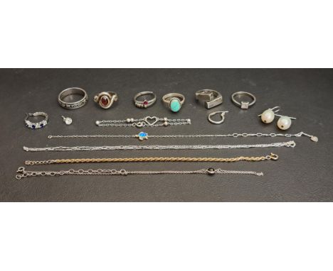 SELECTION OF SILVER AND SILVER MOUNTED JEWELLERYcomprising six rings including a Celtic design band, and a sculptural twist e