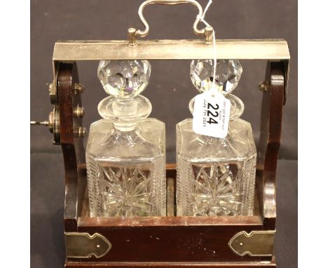 Two decanter tantalus with key. P&amp;P Group 3 (£25+VAT for the first lot and £5+VAT for subsequent lots) 