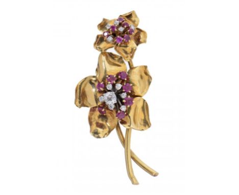 A DIAMOND, RUBY AND GOLD FLOWER CLIP-BROOCH BY CARTIER, MID 20TH C  signed Cartier London, with inventory No 6342, 73mm, 17.7