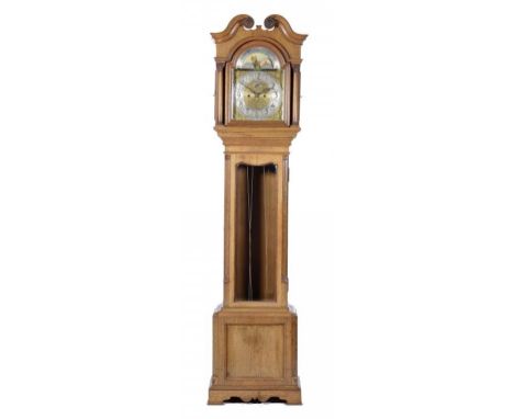 AN OAK EIGHT DAY LONGCASE CLOCK, C1910 the engraved and gilt brass breakarched dial with silvered chapter ring applied with g