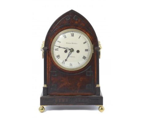 A REGENCY BRASS MOUNTED MAHOGANY BRACKET CLOCK, C1820 the enamelled dial inscribed ROBERT ROSKELL LIVERPOOL, having twin fuse