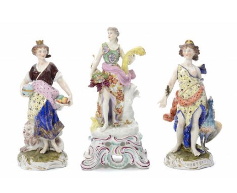 A CHELSEA FIGURE   OF AUTUMN, C1758   on pierced and scrolling puce and turquoise base, 23cm h, red anchor  and a pair of Ger