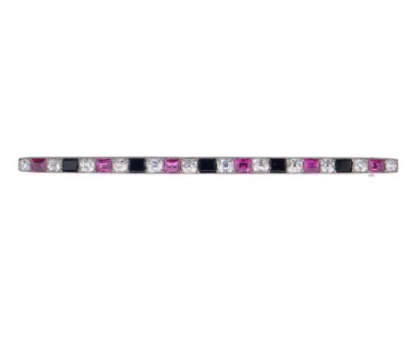 A STYLISH ART DECCO DIAMOND, RUBY AND ONYX BAR BROOCH, C1930 6.5g ++A very attractive brooch in fine condition