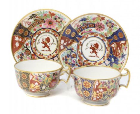 A PAIR OF BARR, FLIGHT & BARR CRESTED TEACUPS AND SAUCERS, C1810 in a Japan pattern, the saucer with crest and motto IN ECCLE